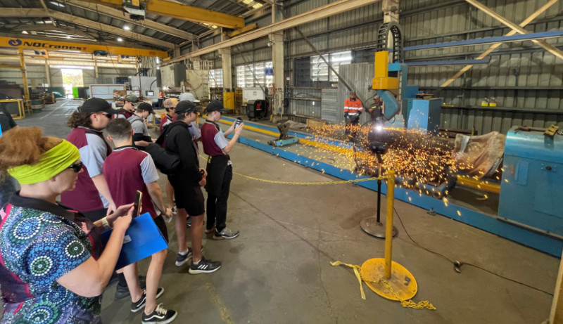 High school students watching welding at global manufacturing group Gladstone.