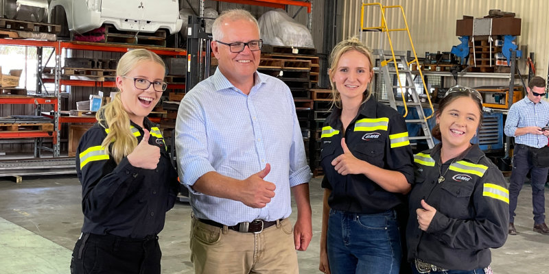 Prime Minster Scott Morrison giving thumbs up with female GMG employees feat